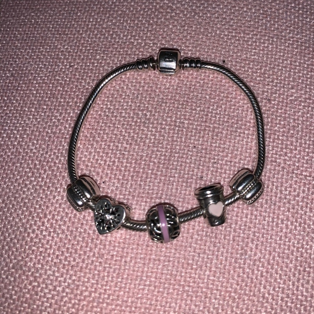 Pandora bracelet with charms and stoppers